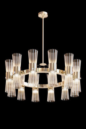 Style for any setting... this beautiful chandelier incorporates twelve softly pleated Murano glass cylinders. Each one has been lightly brushed with a translucent gold leaf powder generating a warm restful light. Modern Gold Leaf Murano Glass Chandelier. 