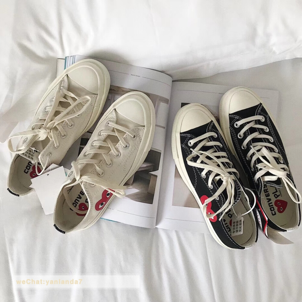 Converse X Play匡威与川久保龄合作款帐布鞋，鞋子是帆布面，手感比普通匡威的帆布鞋厚一点点，图案印制也不含糊，清晰饱满，最关键是可以增高，这款跟普通的帆布鞋底不同,运用了加厚的避震鞋垫，加.上vibram防滑鞋底,走多久的路都不累!轻松自如! 整体造工非常精致，