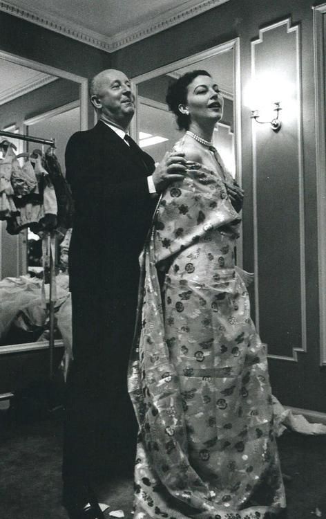 Ava Gardner being fitted for a gown by Christian Dior.