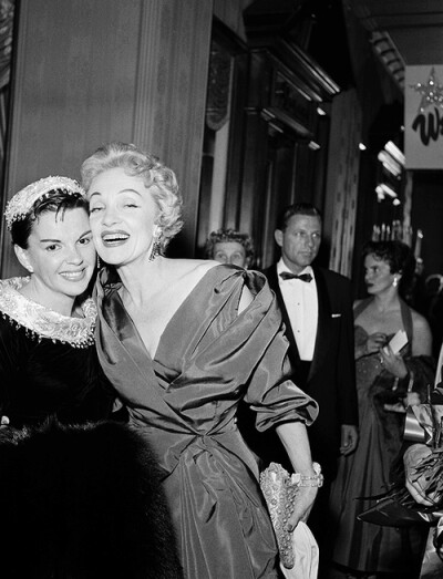 Judy Garland and Marlene Dietrich at the premiere of "A Star is Born"