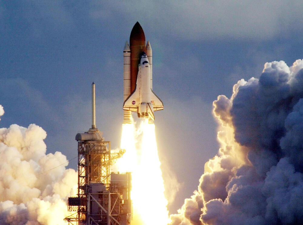 Space shuttle Atlantis and its four-member STS-135 crew head toward Earth orbit and rendezvous with the International Space Station, 8 July 2011. 