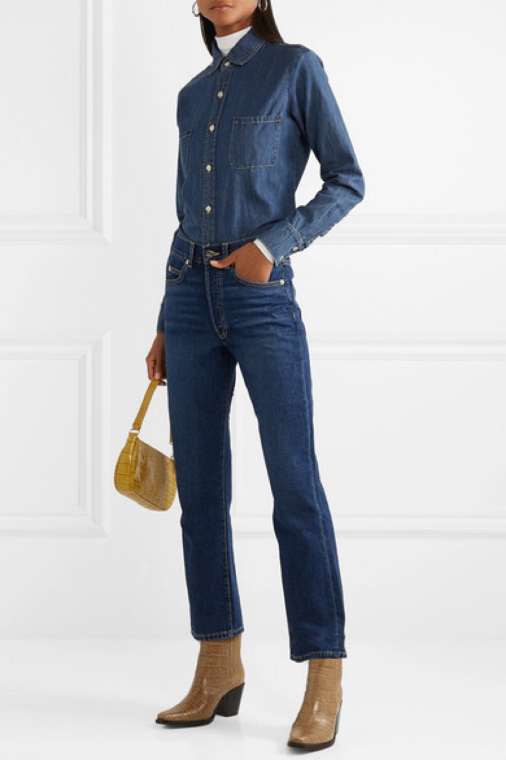 EVE Denim 创始人 Adelaide Bourbon 于法国出生、美国长大，因此她能将两国文化完美融合，所打造出的作品堪称是巴黎和美西碰撞后的绚烂火花。这款 “Simone” 衬衫裁自柔软的牛仔布，对比鲜明的车线勾勒出它略微宽松的廓形。不妨将单品束入同色调牛仔裤中。