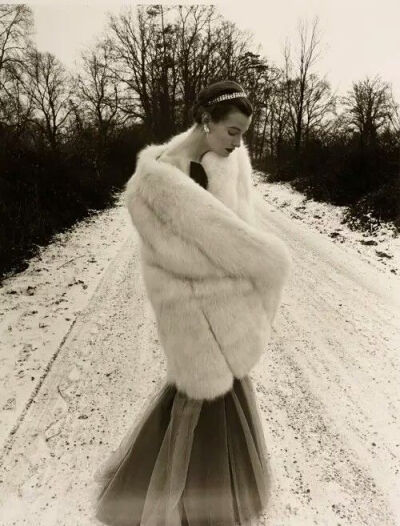 In white fox fur, by Norman Parkinson 1950