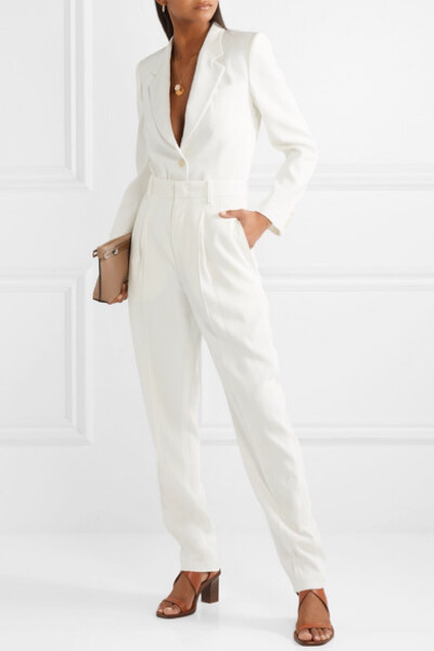 Isabel Marant 钟情于男装的实用一面，因此常常打造男式风格的作品。这款 “Poyd” 长裤采用柔滑的白色绉纱制成，高腰剪裁可在视觉上拉长腿部线条。平直的压痕为超长裤管增加几分利落英气。不妨与配套西装式外套同穿…