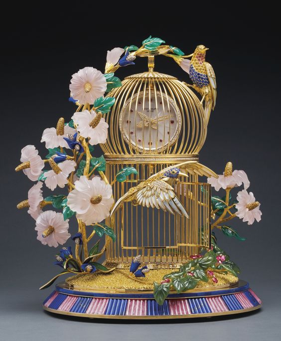 2013年Sotheby's苏富比——PATEK PHILIPPE百达翡丽珠宝座钟，图1、2、3.The Hummingbird Cage Clock，成交价10,360,000港币；图4、5、6.The Birds of Paradise Fountain Clock，成交价8,440,000港币；图7、8、9.The Magpie's Treasure Nest Clock，成交价 18,040,000港币。
