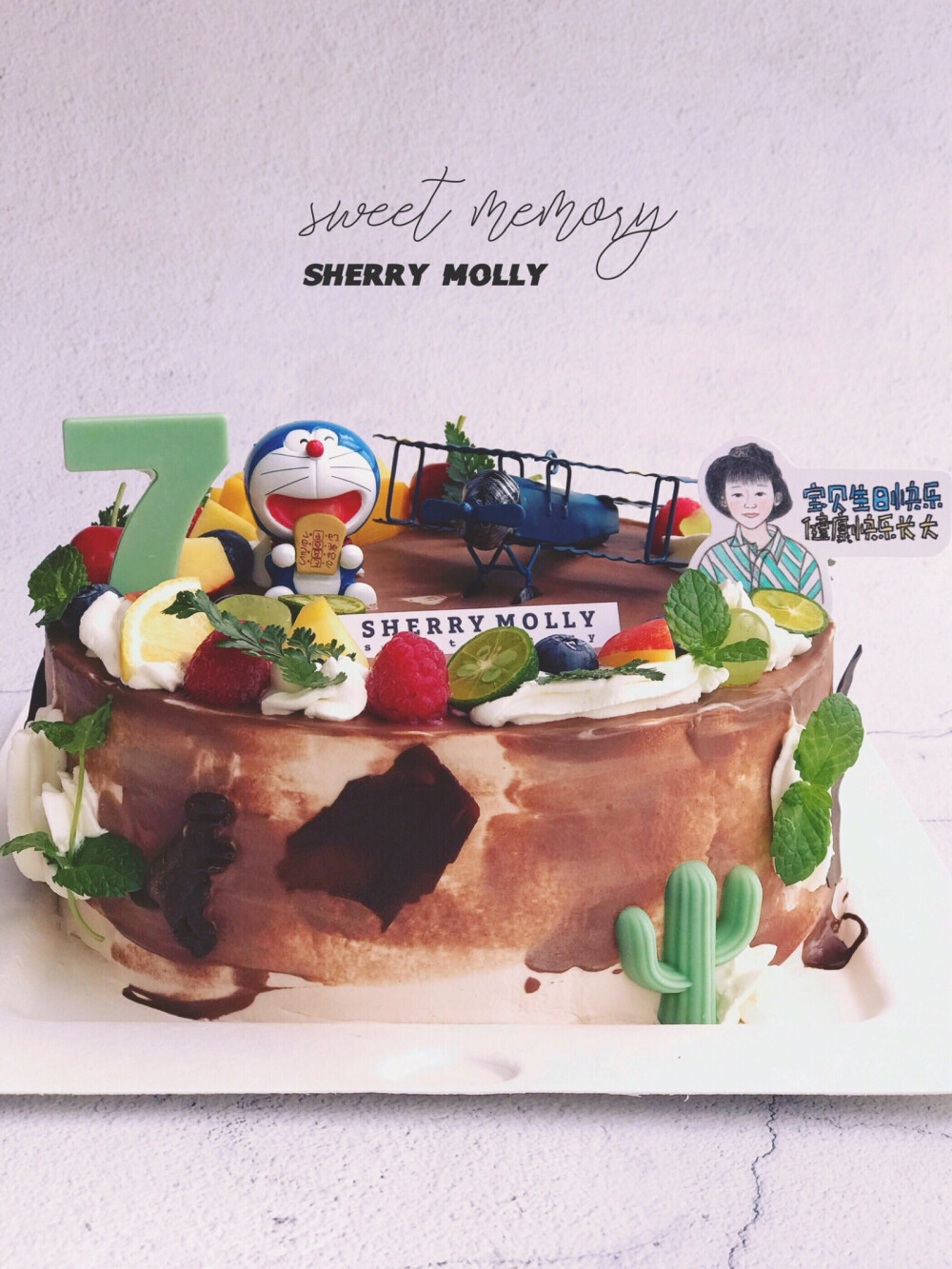 #SHERRY Molly家の下午茶#—『巧克力cake』老客人给儿子订的7周岁生日cake～一个蛋糕上把小朋友喜欢的都放上了呢✈️叮当猫 幸福的小男孩儿呀～