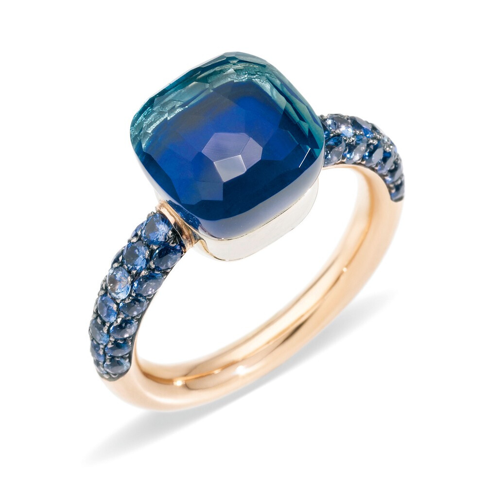 Nudo Deep Blue 玫瑰金戒指，by Pomellato
镶嵌一颗枕形伦敦蓝（London Blue）托帕石，下方以青金石为衬底。