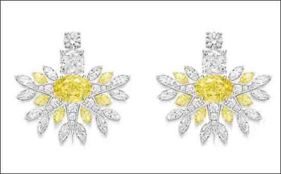 伯爵2019Piaget Golden Oasis系列Rising Star主题耳环
18K白金，镶饰2颗椭圆形切割艳彩黄钻(约重1.50克拉及1.40克拉)、2颗枕形切割美钻(约重0.96克拉及0.95克拉)、12颗马眼形切割黄钻(约重1.44克拉)、24颗马眼形切…