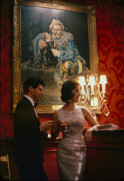 Elizabeth Taylor and her husband Eddie Fisher at the Louis Sherry bar and restaurant at the Metropolitan Opera House opening in New York City, 1959. 
(Photos by Yale Joel/The LIFE PictureCollection)…