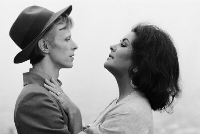 David Bowie and Elizabeth Taylor photographed by Terry O’Neill in Beverly Hills, 1975. ​​