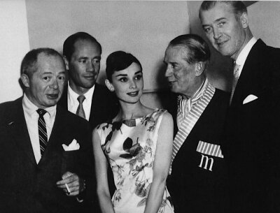 Billy Wilder, Mel Ferrer, Audrey Hepburn, Maurice Chevalier and James Stewart at Ciro's nightclub, 1956 ​