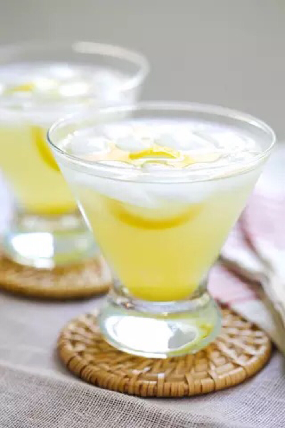 Lemon Drops on the Rocks - easy martini cocktail with vodka, lemon juice, triple sec and sugar. Just mix everything together and your party is on!