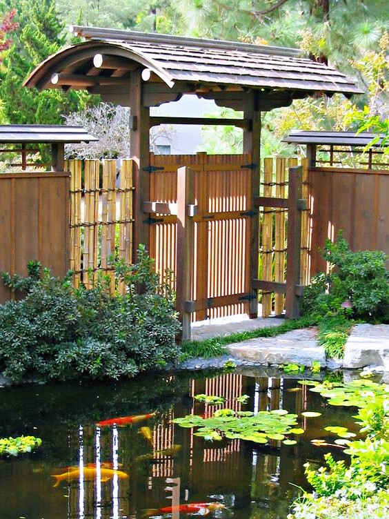 japanese koi ponds | beautiful Japanese Roofed Entry Gate next to a Koi Pond