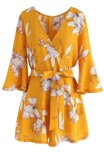 Bold Blooms Floral Wrapped Playsuit in Yellow : It’s play time AND slay time when you slip into this wrapped playsuit. The bold yellow and huge floral print make this the perfect vacation ensemble. …