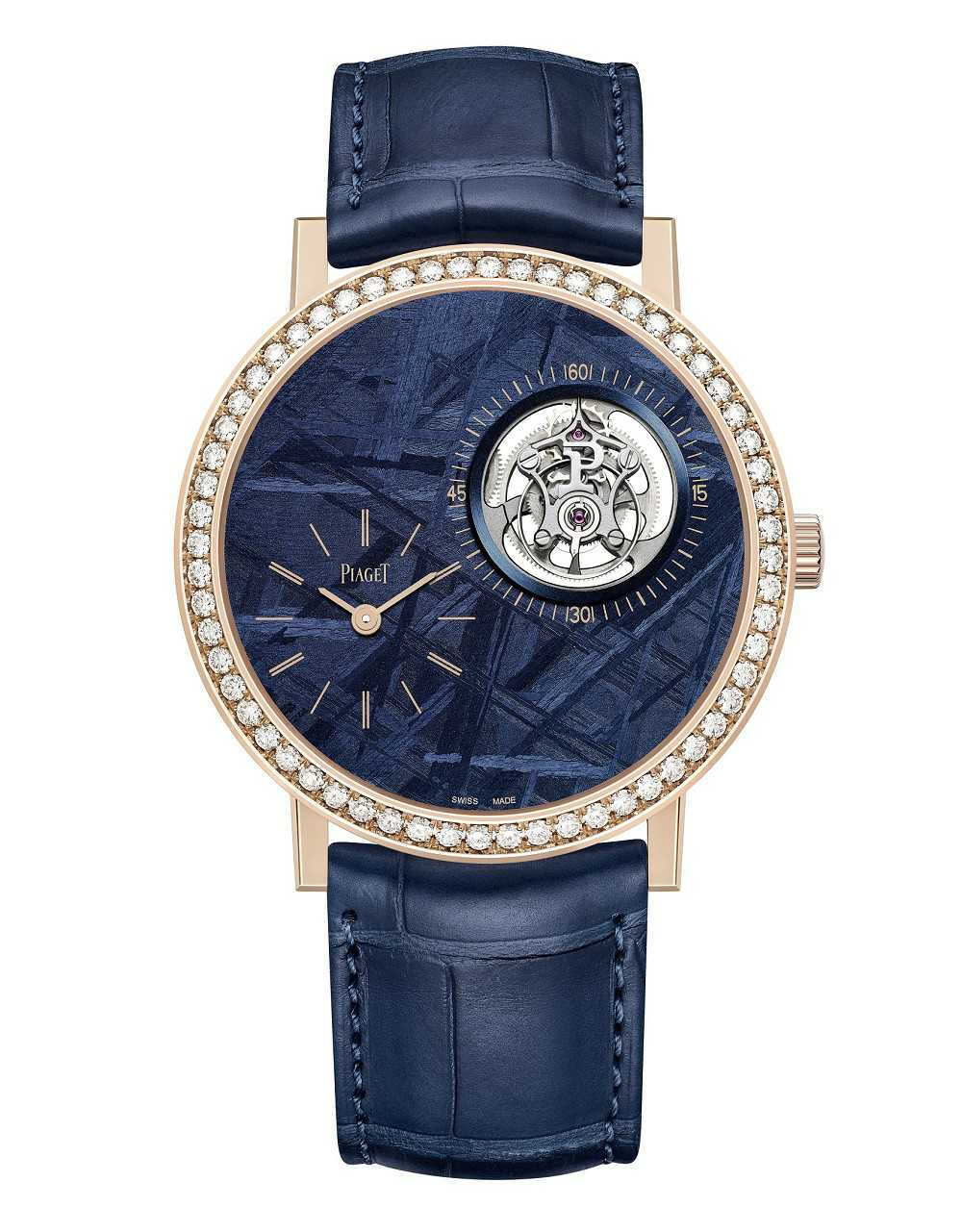 Piaget Altiplano 陨石表盘陀飞轮腕表
这是 Piaget 本届 SIHH 最复杂的一枚作品，在蓝色陨石表盘中融入陀飞轮结构，如同一颗行星在浩瀚宇宙中运转。陨石表盘可以看到独特的「魏德曼花纹」（Widmanstätten patterns），常见于镍铁陨石，据推测其历史可追溯至太阳系形成之初的天体大爆炸。