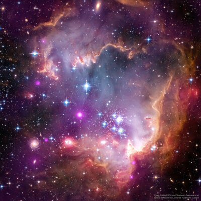 NGC 602及更远之处
影像来源：X-ray: Chandra: NASA/CXC/Univ.Potsdam/L.Oskinova et al; Optical: Hubble: NASA/STScI; Infrared: Spitzer: NASA/JPL-Caltech
