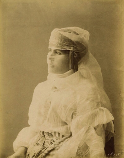 Portrait of a young veiled woman, probably from Turkey. Unknown Photographer, circa 1880 ​​​