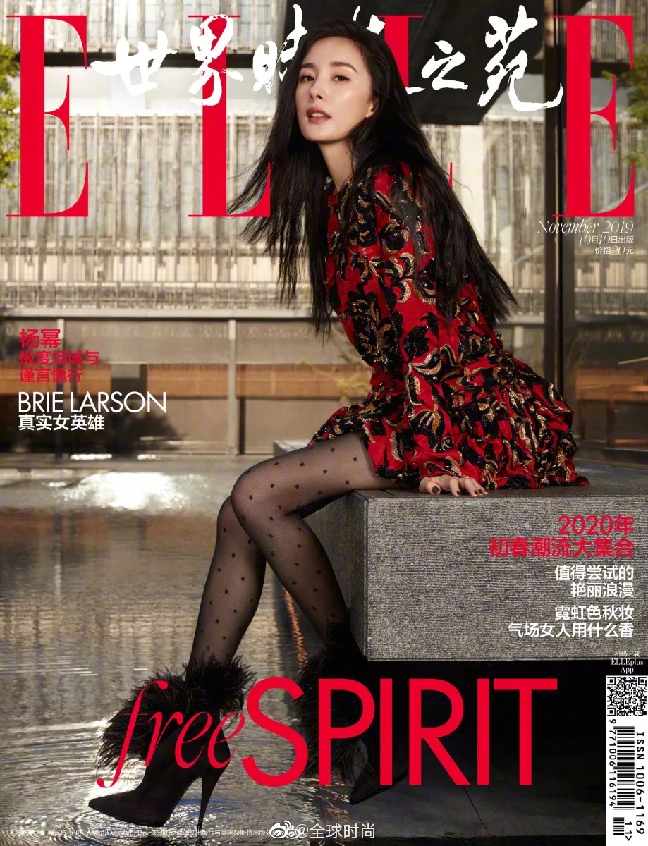 #杨幂 鱼骨辫# 杨幂登《ELLE》十一月刊封面，深V红裙搭配鱼骨辫发型，用活泼调皮完美平衡浓艳与夸张，大幂幂的少女感多年不变。