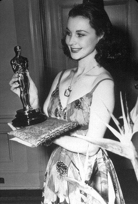 Vivien Leigh proudly holds her Best Actress Oscar on March 2, 1940. She was recognized for her portrayal of Scarlett O'Hara in Gone With the Wind.
