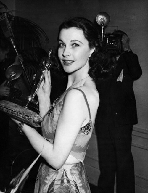 Vivien Leigh proudly holds her Best Actress Oscar on March 2, 1940. She was recognized for her portrayal of Scarlett O'Hara in Gone With the Wind.
