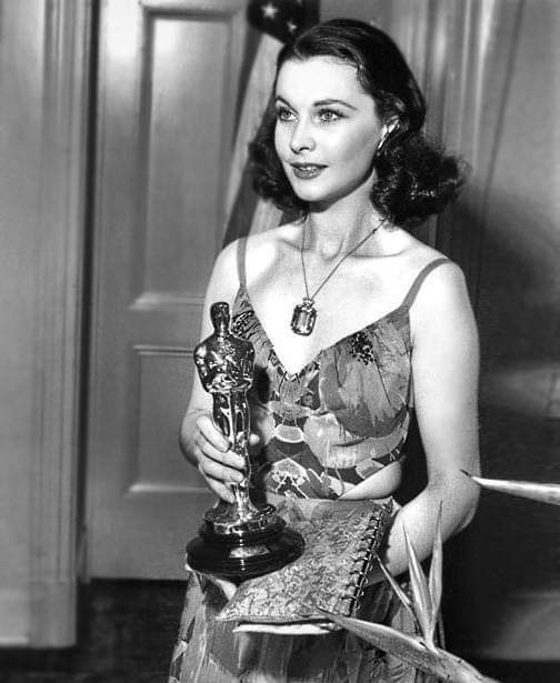 Vivien Leigh proudly holds her Best Actress Oscar on March 2, 1940. She was recognized for her portrayal of Scarlett O'Hara in Gone With the Wind.
