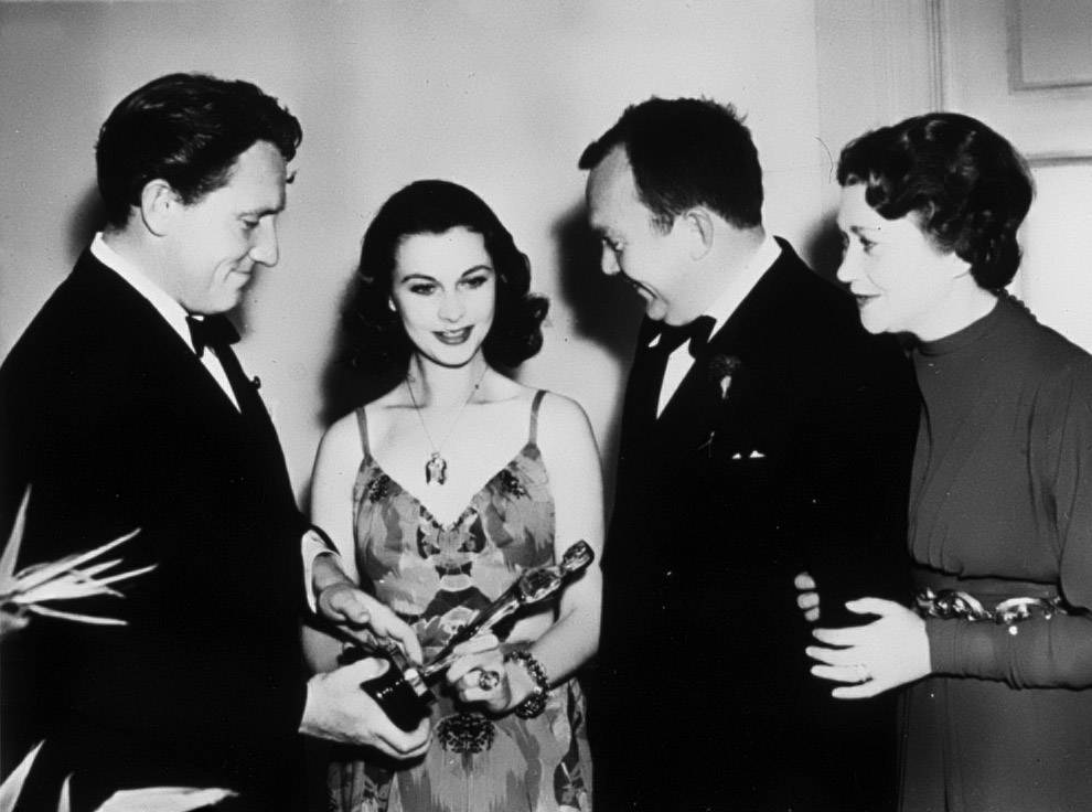 Vivien Leigh proudly holds her Best Actress Oscar on March 2, 1940. She was recognized for her portrayal of Scarlett O'Hara in Gone With the Wind.
