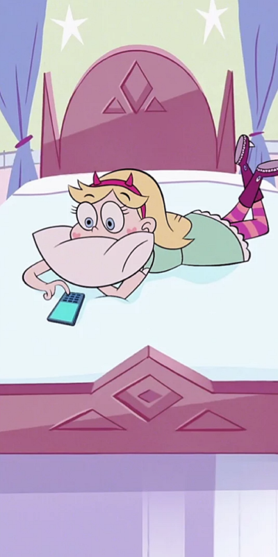 Star sits on the bed waiting for Oscar's call.
