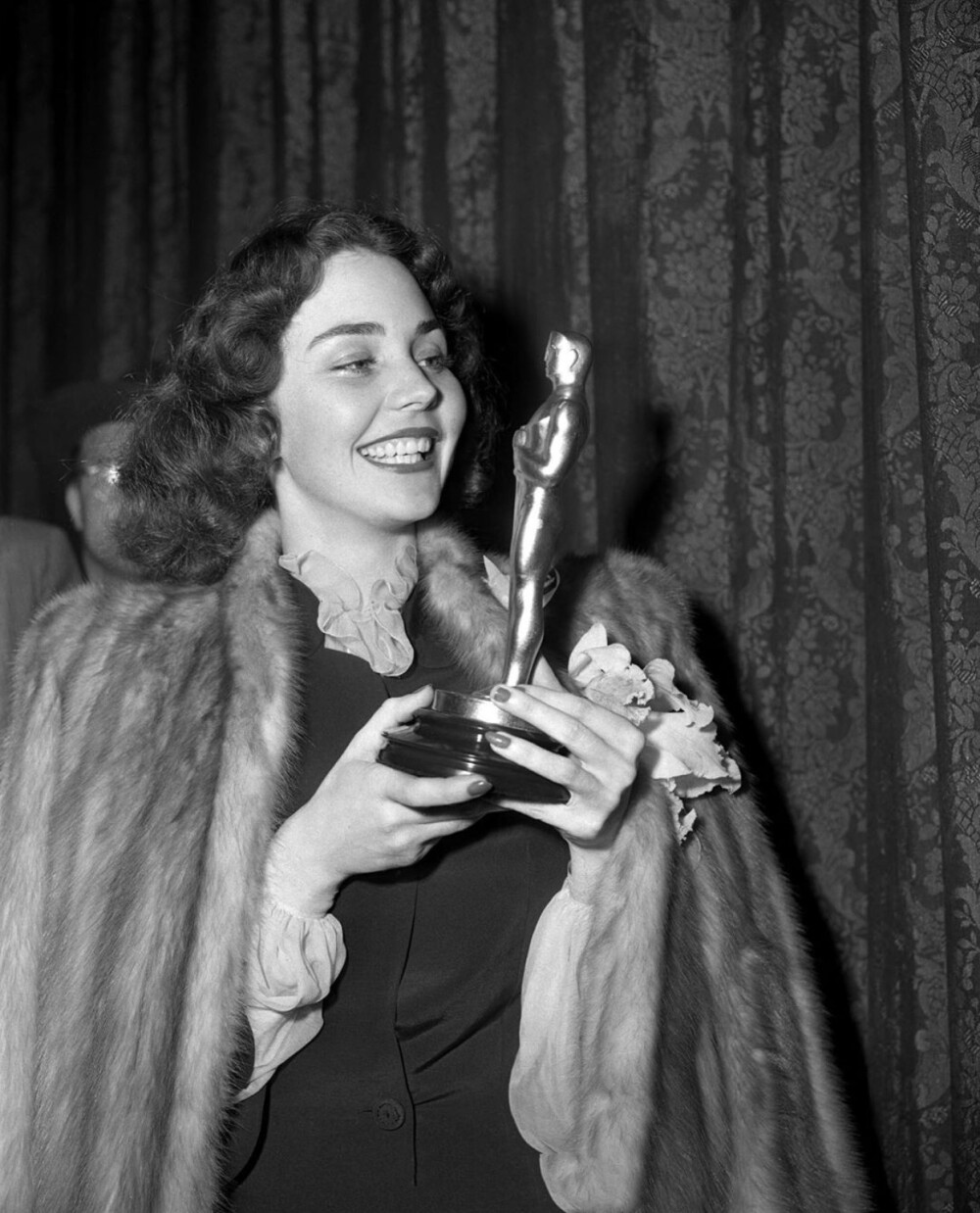 Jennifer Jones photographed with her Best Actress award at the 16th Academy Awards, March 2nd, 1944.