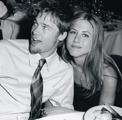 Jen and Brad at real “Monica”’s wedding.