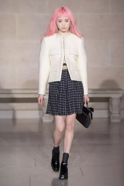 Fernanda Ly walking for Louis Vuitton